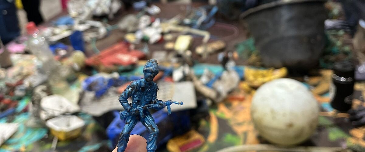 After the Symposium, a beach cleanup was organized. This plastic toy soldier had invaded the beach.